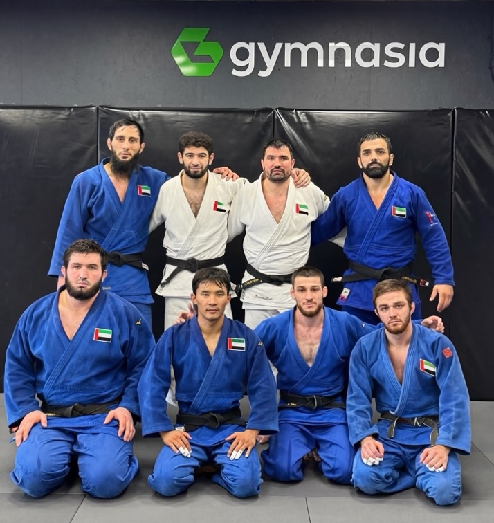 Visiting group gathered inside the training facility